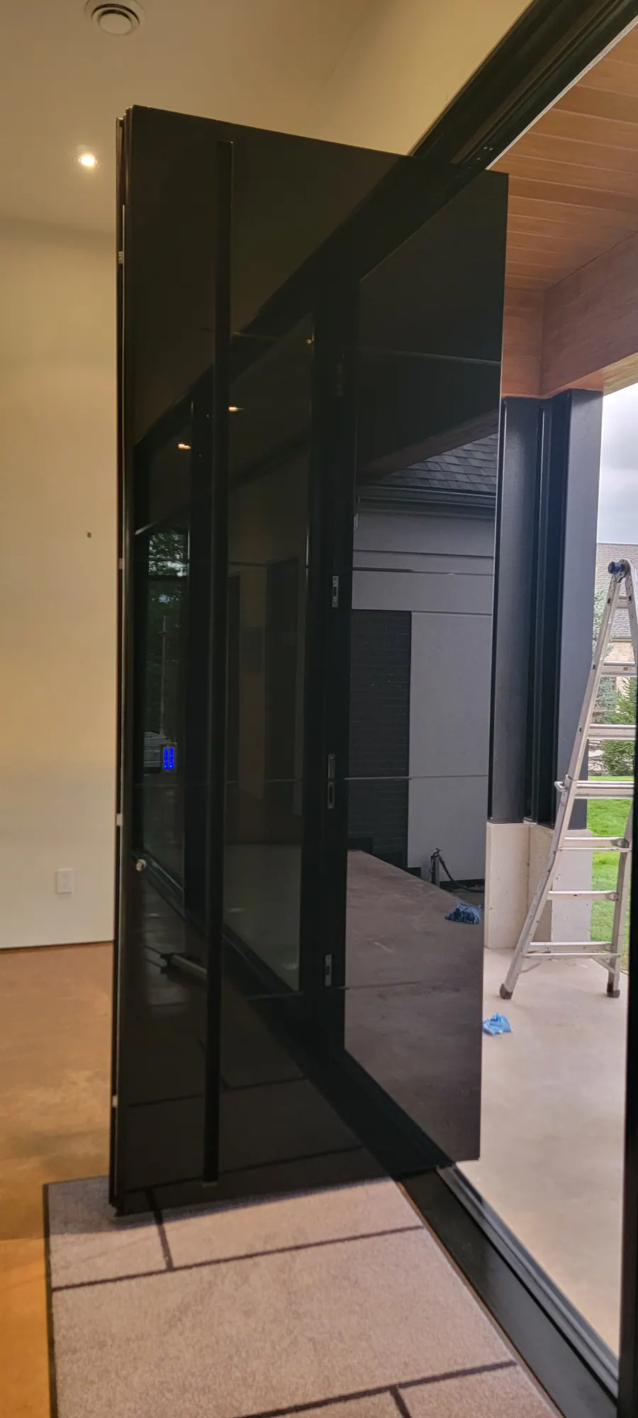Custom pivot door installed by Better View
