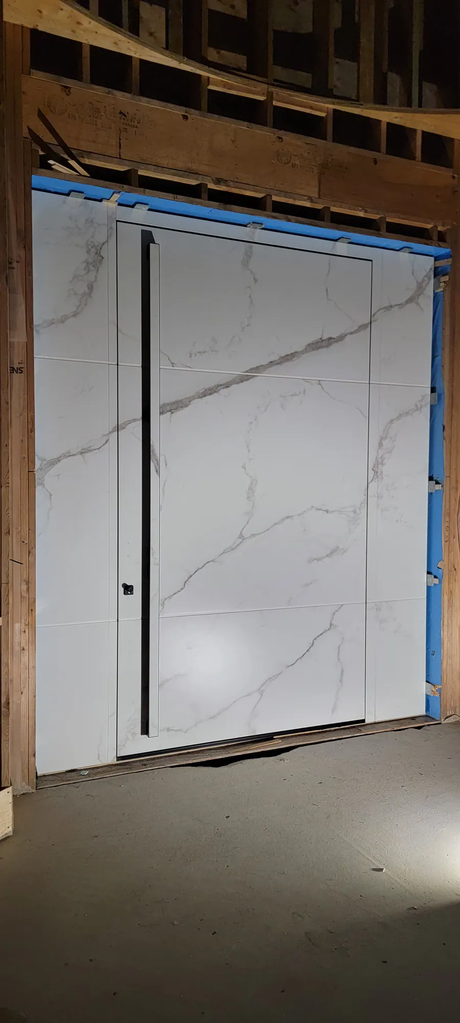 Custom pivot door installed by Better View