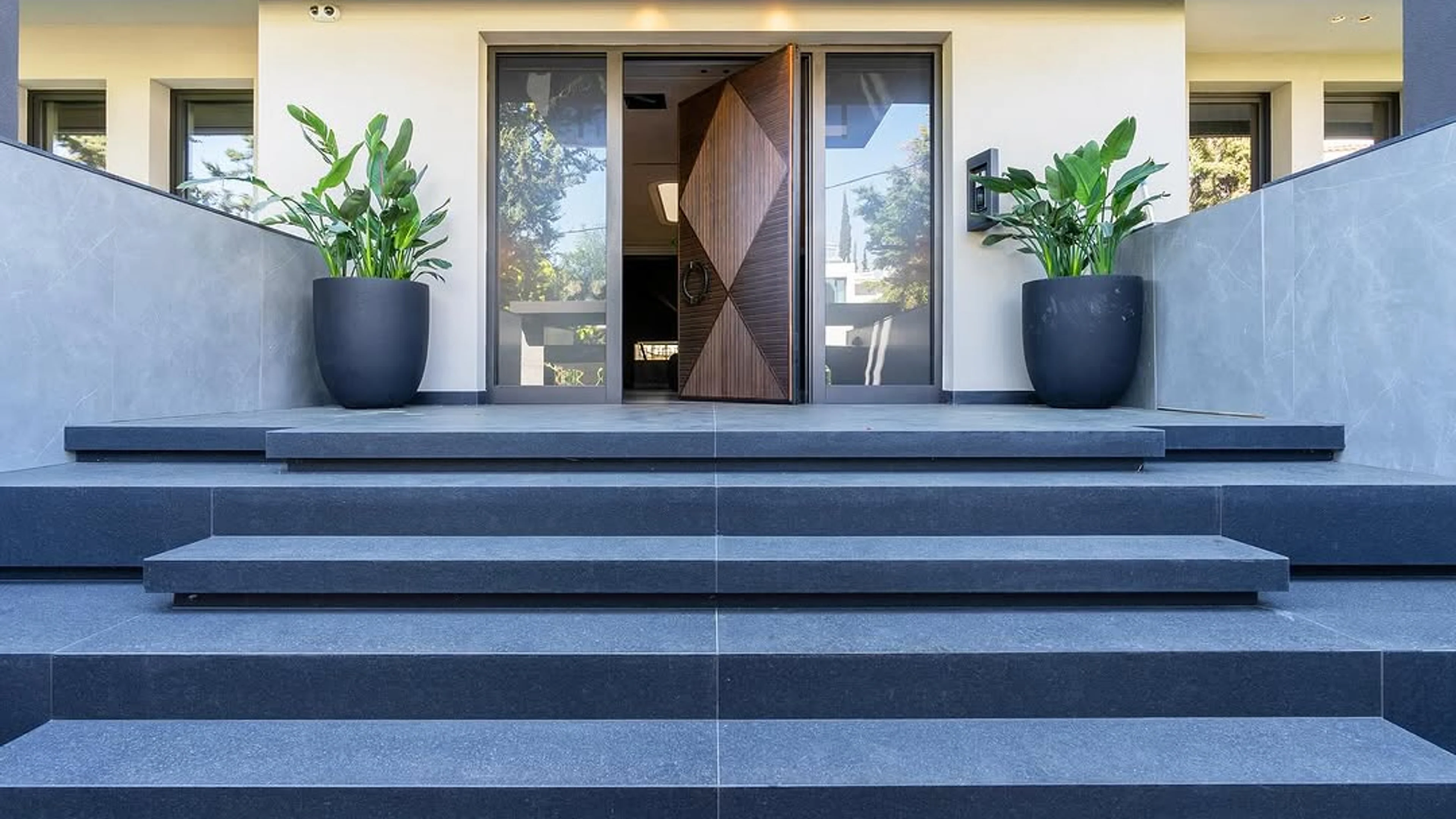 Modern security entrance with wood door and glazed sidelites