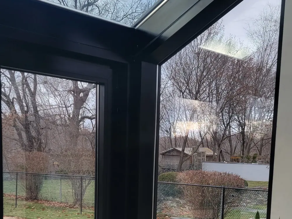 Inside the sunroom: glass roof and walls