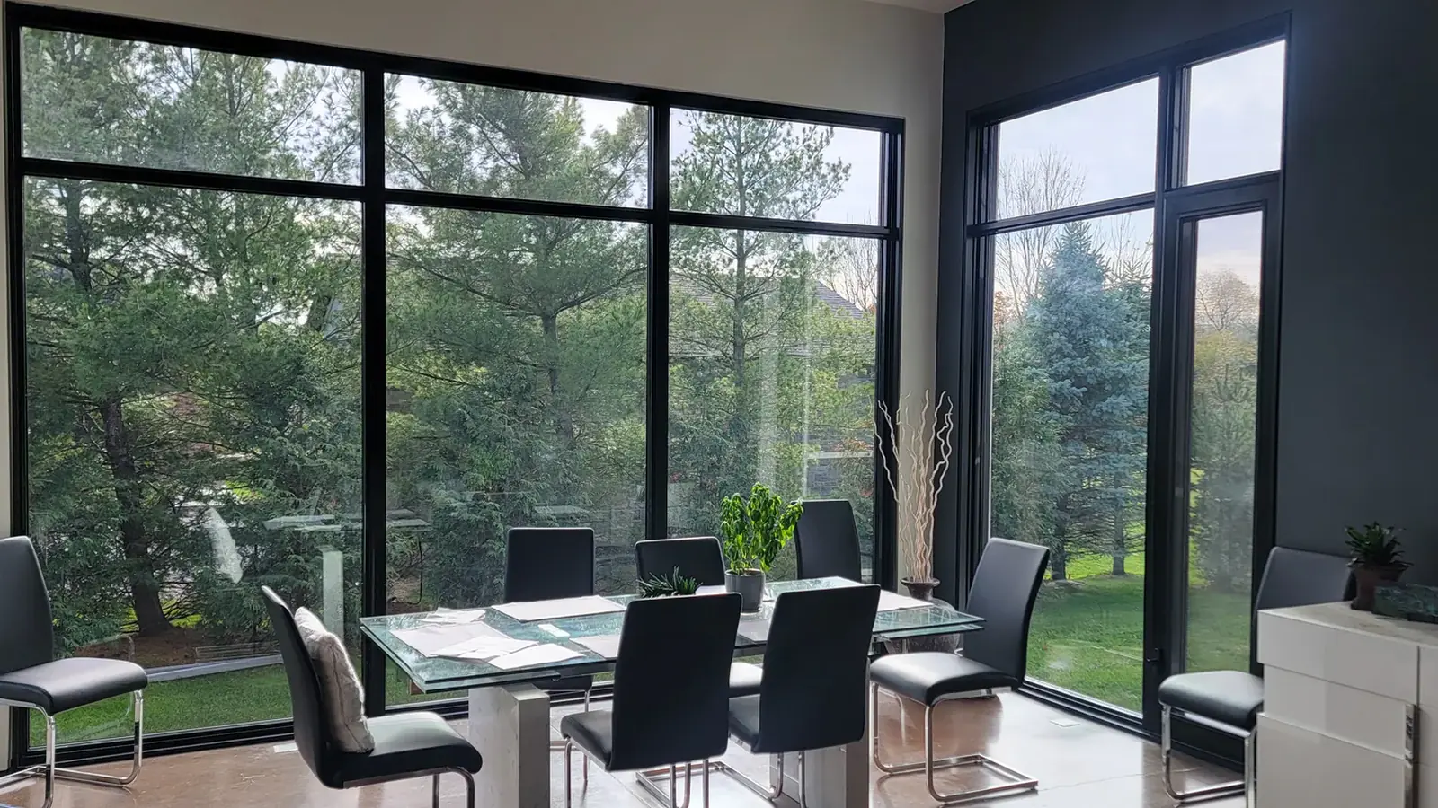 Floor-to-ceiling window wall in a dining room