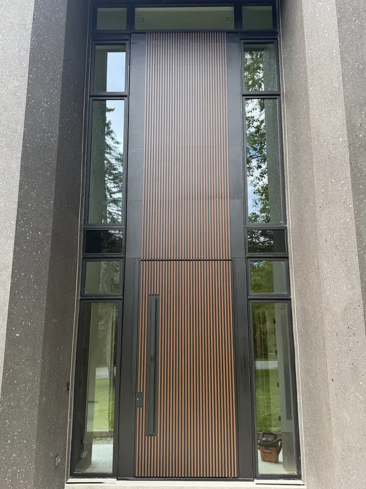 Wood-slat pivot door, Mississauga