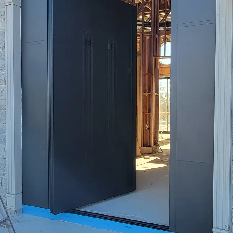 Oversized flush pivot door