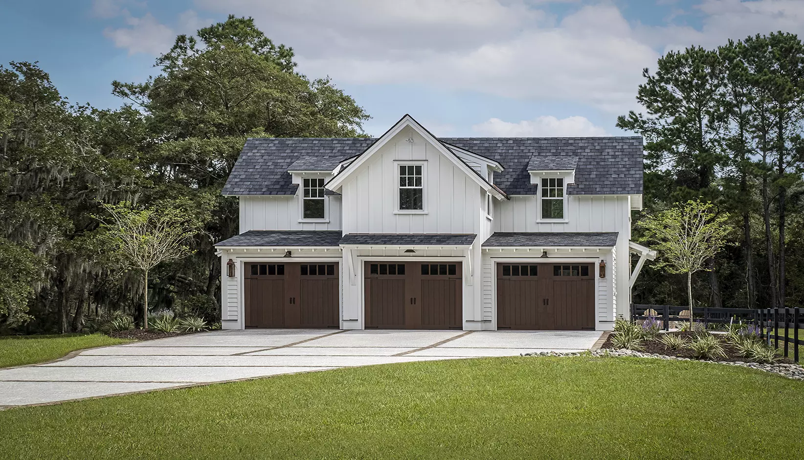 Carriage house garage door with decorative paneling