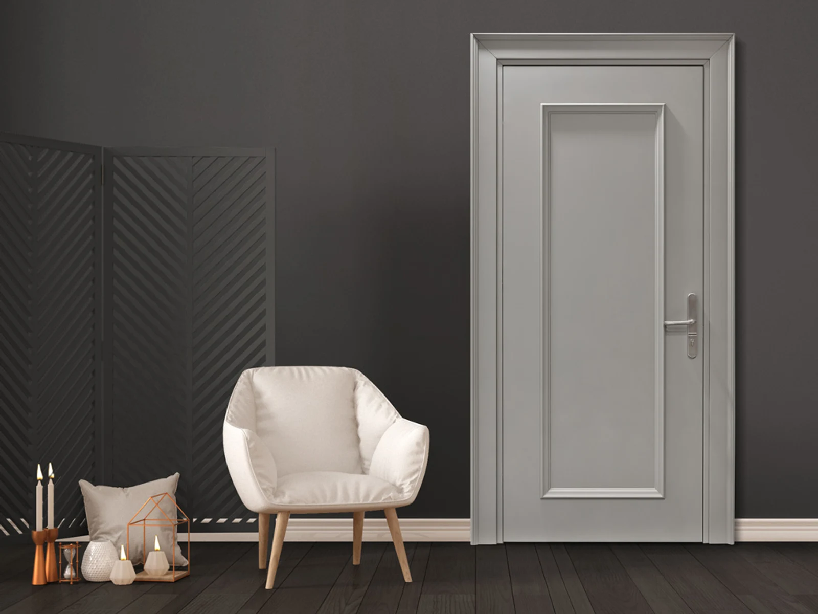 Gray raised panel interior door in a dark finished room